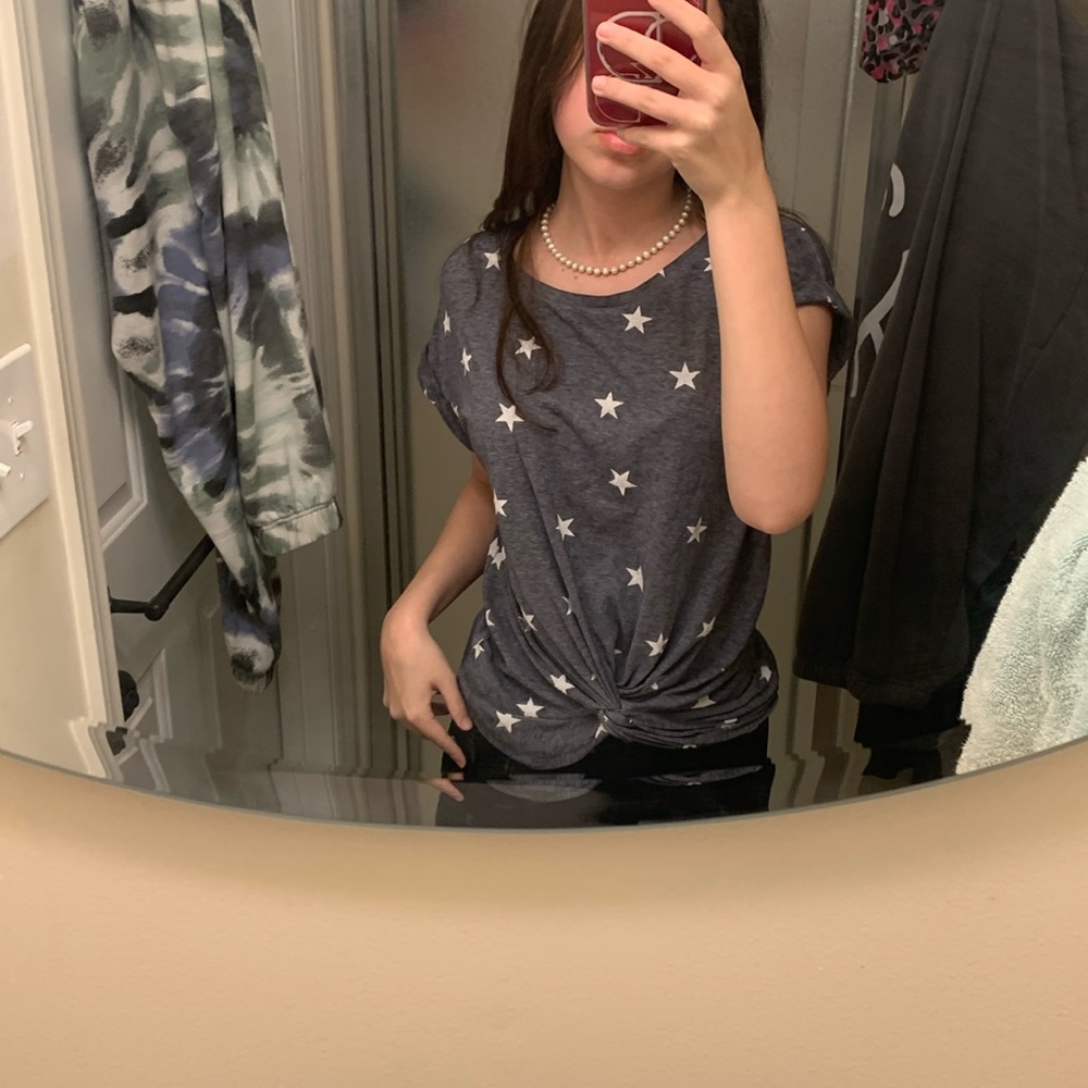 dark grey, white star pattern, XS tee shirt, tied at front
